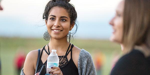 young woman at backyard bash